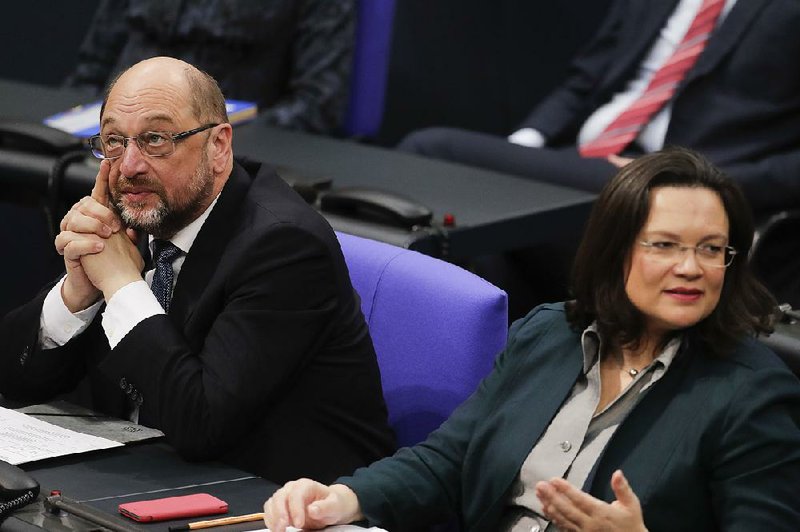 Martin Schulz (left), the chairman of Germany’s Social Democratic Party, and party faction leader Andrea Nahles attend a parliamentary session Tuesday in Berlin. 