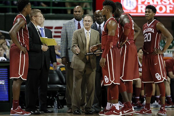 Oklahoma head coach Lon Kruger instructs his team in the second half of an NCAA college basketball game against Baylor on Tuesday, Feb. 21, 2017, in Waco, Texas. (AP Photo/Tony Gutierrez)
