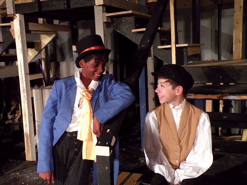 Melody Small of Little Rock, left, appears as The Artful Dodger, and Hayden Woods of Malvern appears as Oliver Twist in The Royal Players’ upcoming production of the musical Oliver! The show will open Thursday and continue through Dec. 10 at The Royal Theatre in Benton.
