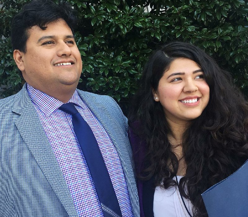 Juan Mendez and Rocio Aguayo stand outside a congressional building in Washington on Nov. 15 during a trip to meet with Arkansas lawmakers and tell them how “we were able to actually live our own American dream.”