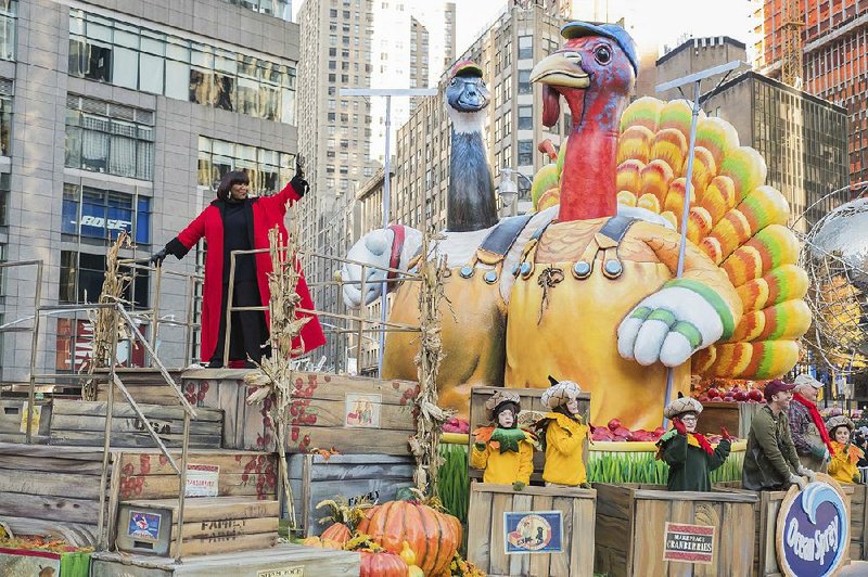 Singer Patti LaBelle waves from a float at the 91st Macy’s Thanksgiving Day Parade in New York. 