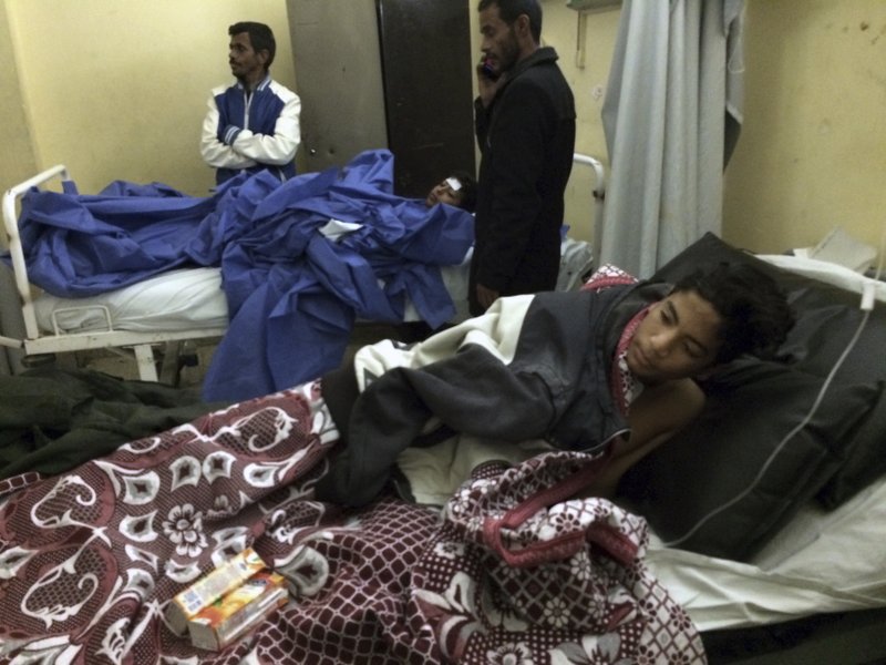 Abdallah Abdel Nasser, 14, receives medical treatment at Suez Canal University hospital in Ismailia, Egypt, Friday, Nov. 24, 2017, after he was in injured during an attack on a mosque. Militants attacked a crowded mosque during Friday prayers in the Sinai Peninsula, setting off explosives, spraying worshippers with gunfire and killing more than 200 people in the deadliest ever attack by Islamic extremists in Egypt. (AP Photo/Amr Nabil)
