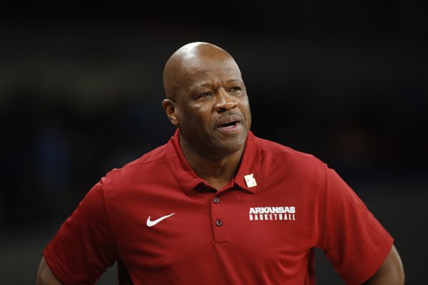 Arkansas head coach Mike Anderson watches the action in the first half of an NCAA college basketball game during the Phil Knight Invitational tournament in Portland, Ore., Friday, Nov. 24, 2017. (AP Photo/Timothy J. Gonzalez)

