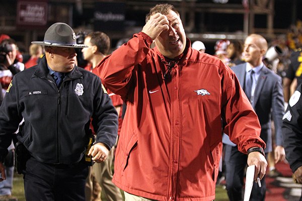 Arkansas coach Bret Bielema walks off the field following a 48-45 loss to Missouri on Friday, Nov. 24, 2017, in Fayetteville. Bielema was fired following the game, ending his five-year tenure at Arkansas, where he was 29-34 overall and 11-29 in SEC games. 