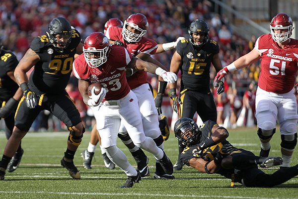 Arkansas running back David Williams (33) carries the ball during a game against Missouri on Friday, Nov. 24, 2017, in Fayetteville. 
