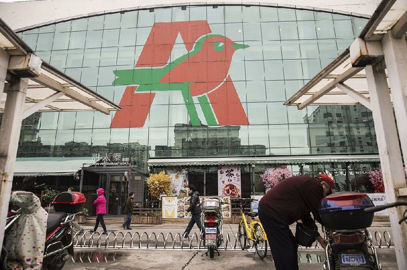 Auchan hypermarkets, like the one shown here in Shanghai, are operated by Sun Art Retail Group Ltd. and offer items ranging from groceries to electronics.