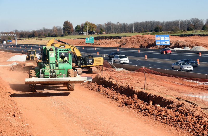 Work continues Wednesday along Interstate 49 near Central Avenue in Bentonville.