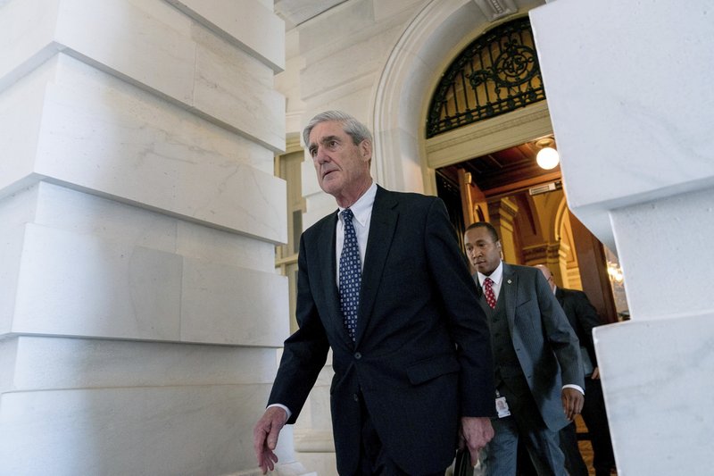 FILE - In this June 21, 2017, file photo, former FBI Director Robert Mueller, the special counsel probing Russian interference in the 2016 election, departs Capitol Hill in Washington. As Congress returns from its Thanksgiving break, some Republicans would like to wrap up investigations into Russian meddling in the 2016 election that have dragged on for most of the year. But with new details in the probe emerging on an almost daily basis, that timeline seems unlikely. (AP Photo/Andrew Harnik, File)