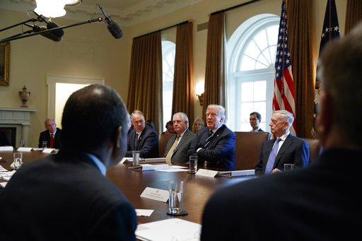 FILE - In this Oct. 16, 2017, file photo President Donald Trump speaks during a cabinet meeting at the White House in Washington, with from left, Director of National Intelligence Dan Coats, Interior Secretary Ryan Zinke, Secretary of State Rex Tillerson, and Defense Secretary Jim Mattis. (AP Photo/Evan Vucci)