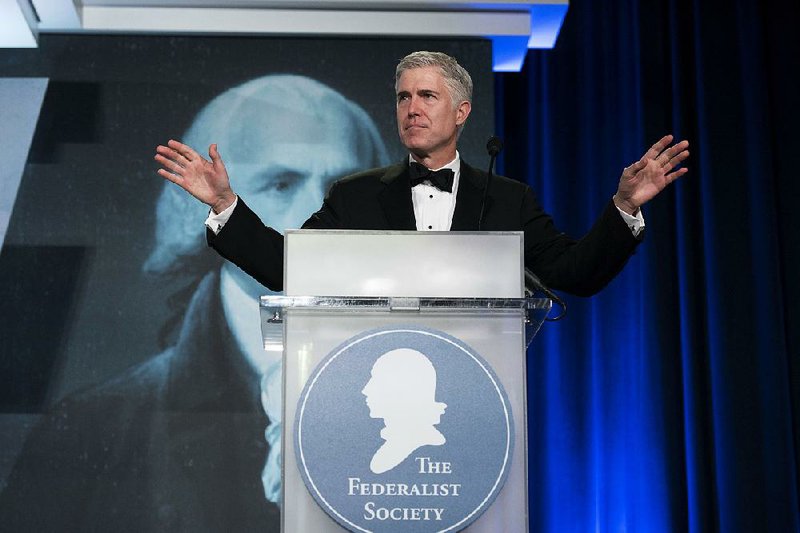 Supreme Court Justice Neil Gorsuch speaks earlier this month at the Federalist Society’s National Lawyers Convention in Washington. 