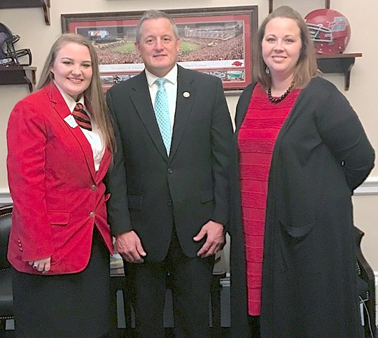 Submitted photo Centerpoint High School senior Karlie Reid, left, recently met U.S. Rep. Bruce Westerman, center, R-District 4, when she traveled to Washington, D.C., for the Family, Career and Community Leaders of America's Capitol Leadership and National Cluster Meeting. She was accompanied by her adviser, Amber Boyett. Reid is the daughter of David and Kristy Wolfe. She served in multiple FCCLA offices including chapter president and District V Secretary for 2016-17. She is a five-year member of the Centerpoint High School chapter of FCCLA.