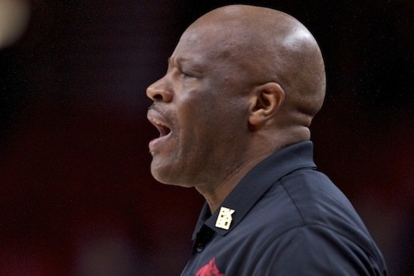 Arkansas head coach Mike Anderson yells during the first half of an NCAA college basketball game against Connecticut in the Phil Knight Invitational tournament in Portland, Ore., Sunday, Nov. 26, 2017. 