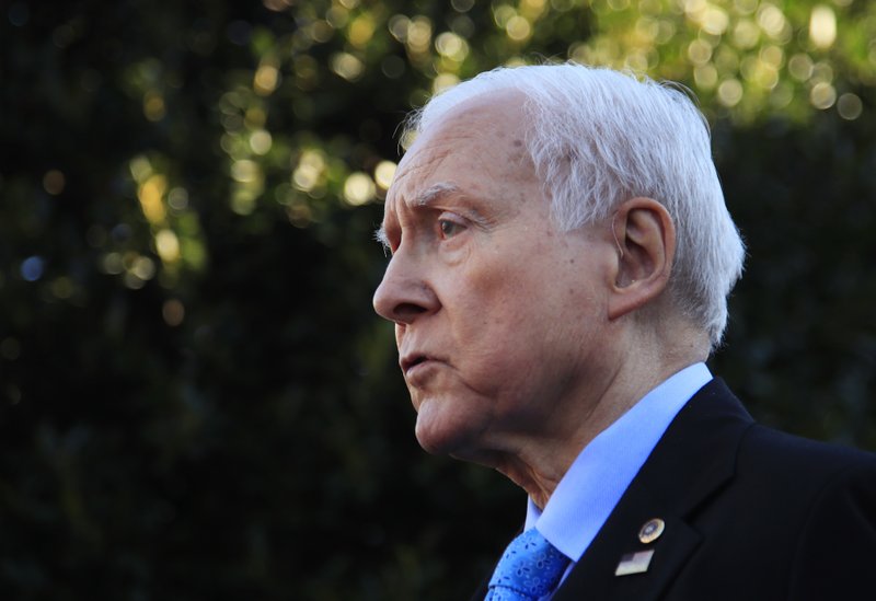 The Associated Press HATCH SPEAKS: Senate Finance Committee Chairman Orrin Hatch, R-Utah, speaks to reporters following a meeting with President Donald Trump at the White House in Washington, Monday.