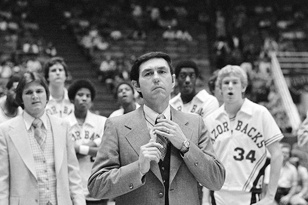 University of Arkansas head basketball coach Eddie Sutton watches as his Razorbacks are introduced prior to their Southwest Conference Tournament game with SMU in Houston, Texas, March 2, 1978. (AP Photo)

