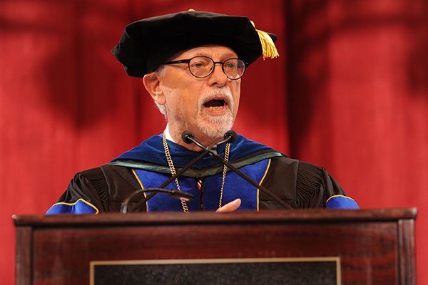 Joseph Steinmetz, chancellor at the University of Arkansas, speaks Friday, May 12, 2017, during commencement exercises for the Fulbright College of Arts and Sciences at the university in Bud Walton Arena. 