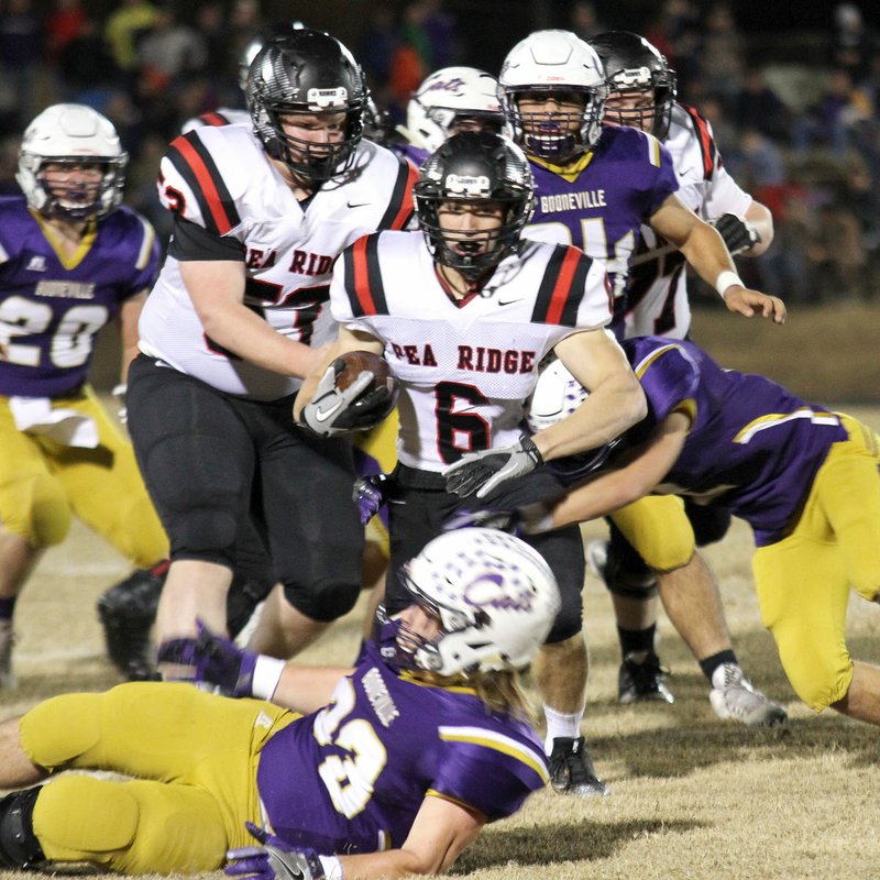 Photograph courtesy of Stephanie Harwell Blackhawk senior Drew Winn (No. 6) led the Blackhawk offense Friday night in the 4A state playoff semifinal game against Booneville gaining 167 yards on 33 carries, surpassing his elder brother's yardage record.