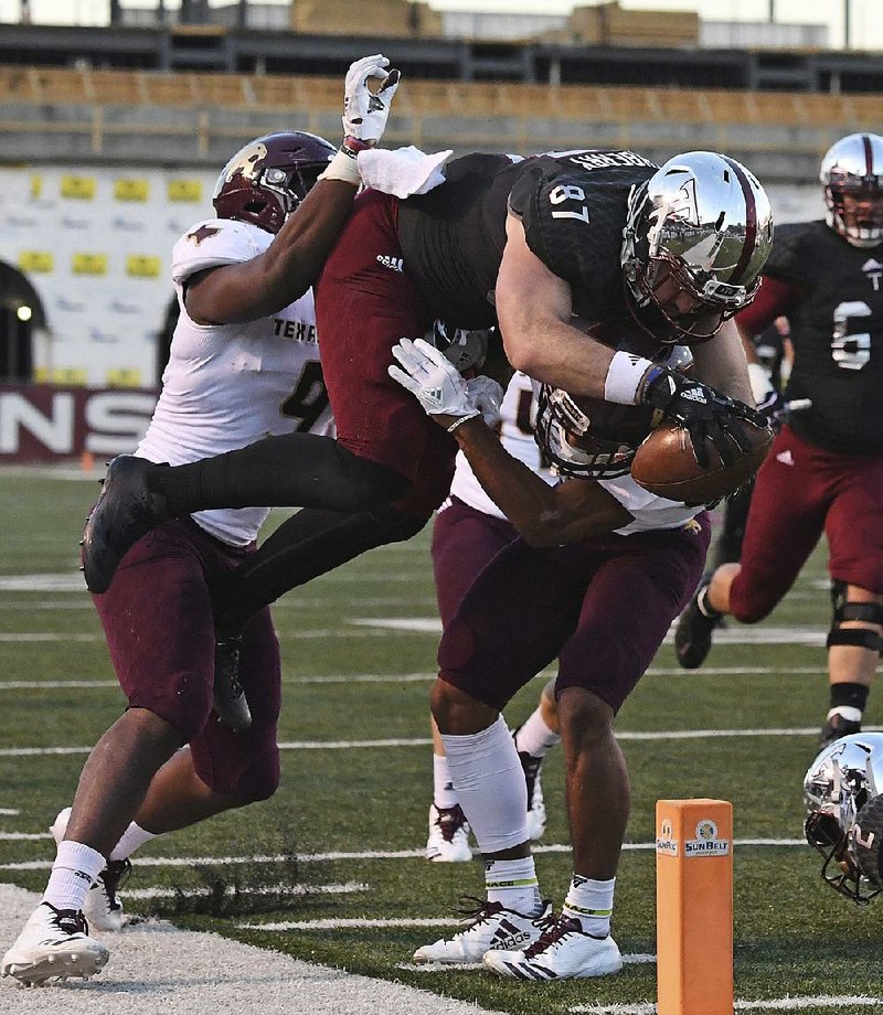 Wide receiver Clark Quisenberry (87) and the Troy offense are averaging 268.5 yards through the air this season. 