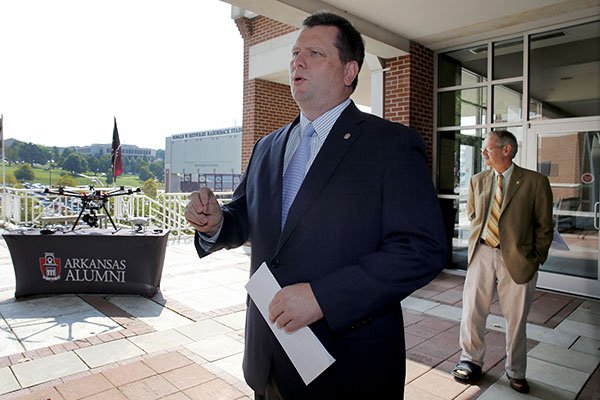 Mark Rushing, director of strategic communications with the University of Arkansas, speaks to media members on Monday, Aug. 31, 2015, in Fayetteville. 
