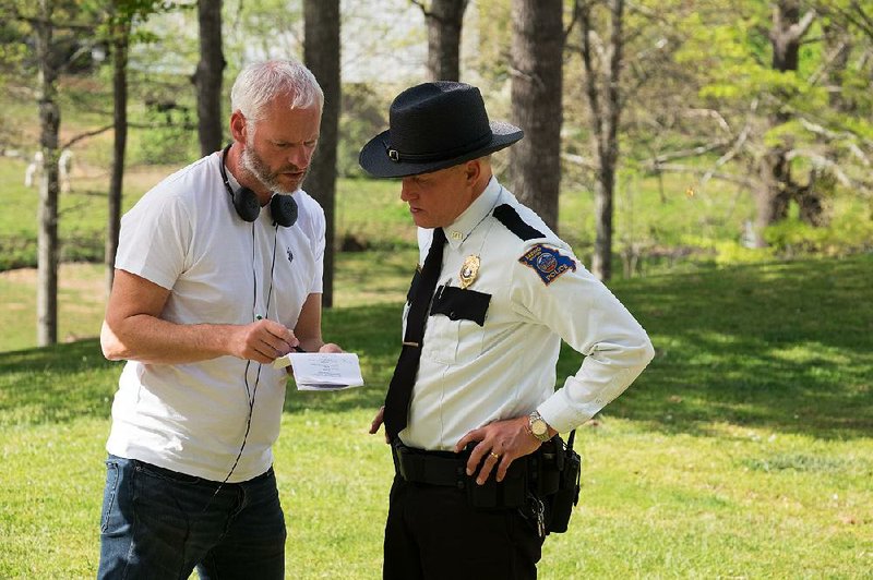 Writer-director Martin McDonagh confers with Woody Harrelson on the set of his latest film, the black comedy Three Billboards Outside Ebbing, Missouri.
