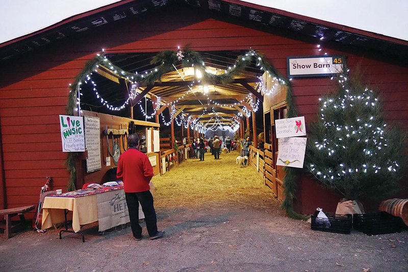 The show barn at Heifer Ranch in Perryville was decorated last year for the ranch’s Christmas event, and the barn will be open again this year for The Holiday Hoopla, set for 5-8 p.m. Friday and 3-6 p.m. Saturday. Activities include photos with animals, international gifts for sale and a chance to win a night on the ranch.