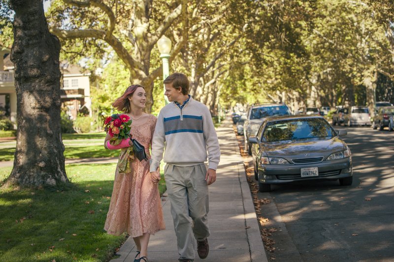 This image released by A24 Films shows Saoirse Ronan, left, and Lucas Hedges in a scene from "Lady Bird." The film, directed by Greta Gerwig, was named best picture by the New York Film Critics Circle Awards on Thursday, Nov. 30. (Merie Wallace/A24 via AP)