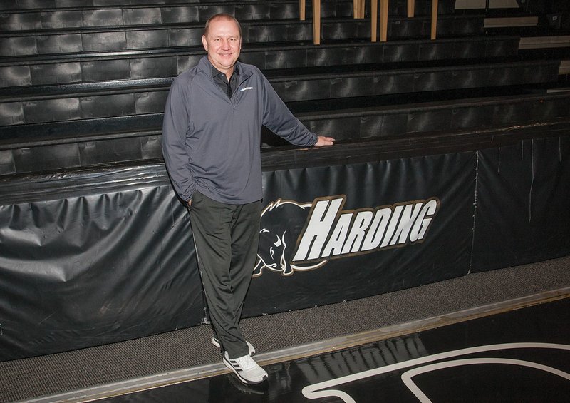 Harding University men’s basketball coach Jeff Morgan stands near the baseline of the court inside Rhodes-Reaves Field House. Morgan, who is now in his 25th year as coach of the Bisons, was recently named as Harding’s next athletic director and will take over for Greg Harnden, who will retire in August 2018.