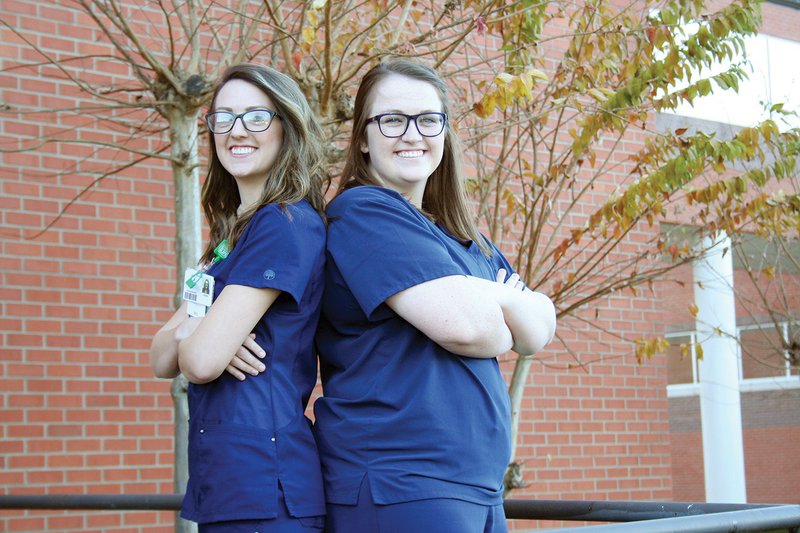 Lyndee Owens, left, and her sister Courtney Owens started their nursing careers together at Saline Memorial Hospital in Benton this summer. The sisters, who graduated from Southern Arkansas University in Magnolia in May, said the best part of being a nurse is the relationships they form with patients.