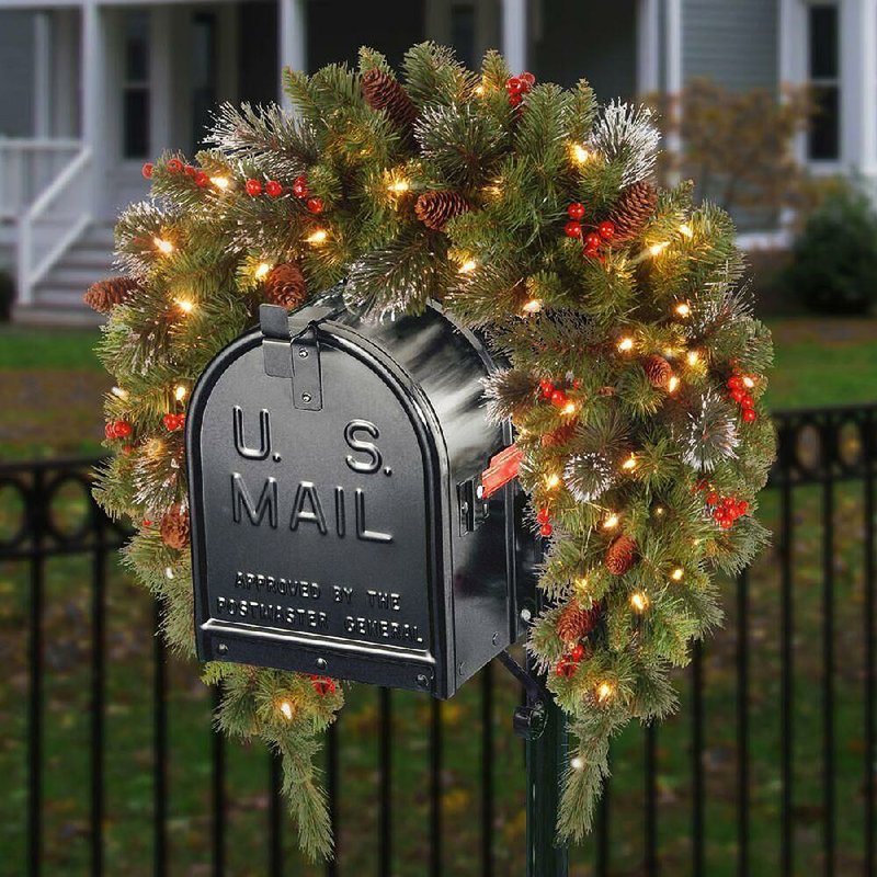 Battery-operated strands of holiday lights mean you can stop decorating based on where your outlets are. Now you can have lighted mailbox swags, door wreaths and garland on the mantel without unsightly cords.