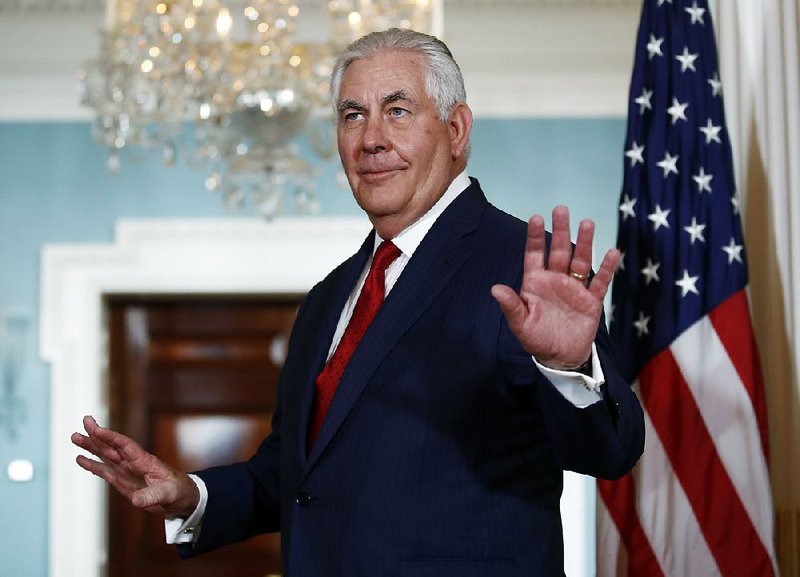 Secretary of State Rex Tillerson leaves a meeting Friday with Libyan Prime Minister Fayez al-Sarraj at the State Department, where he called speculation that he was being fired “laughable.”