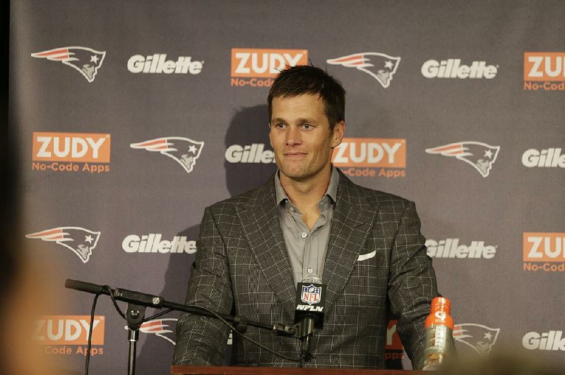 New England Patriots quarterback Tom Brady responds to questions during a news conference after an NFL football game Sunday, Oct. 15, 2017, in East Rutherford, N.J. The Patriots won 24-17. 