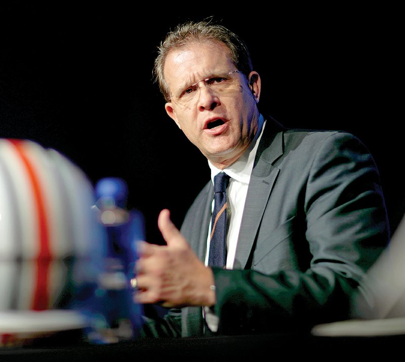 The Associated Press LEADING CANDIDATE: Auburn head coach Gus Malzahn speaks during an NCAA football news conference for the Southeastern Conference championship game against Georgia in Atlanta Friday.