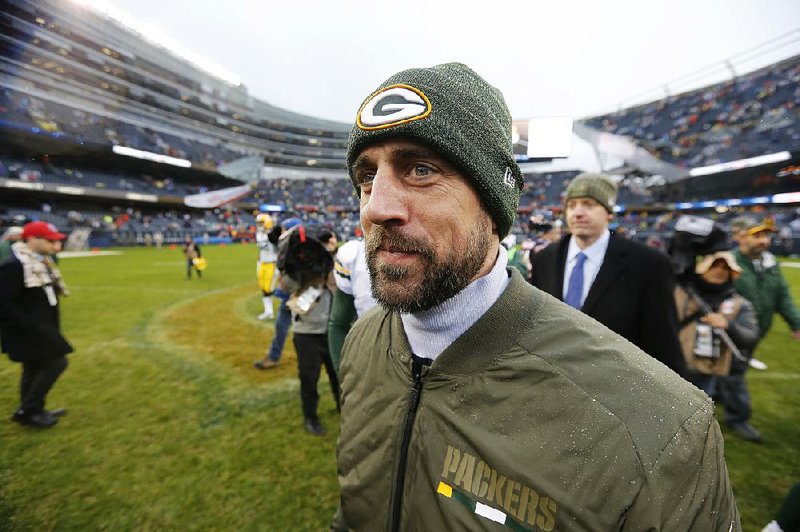 Green Bay’s Aaron Rodgers walks off the field after a game in Chicago on Nov. 12. Rodgers reportedly mingled with fans on a Chicago street following the game.  