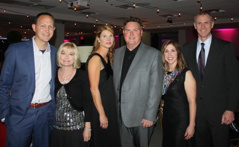 NWA Democrat-Gazette/CARIN SCHOPPMEYER Jason and Michelle Nichol (from left), Barbara and Shawn Baldwin and Kelly Kemp McLintock and Ben McLintock welcome guests to the Big Night benefit for the Jones Center on Nov. 11.
