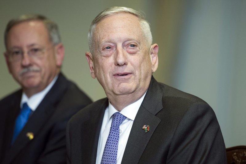 Defense Secretary Jim Mattis answers a reporter's question during a meeting with Libyan Prime Minister Fayez Serraj at the Pentagon, Thursday, Nov. 30, 2017. 