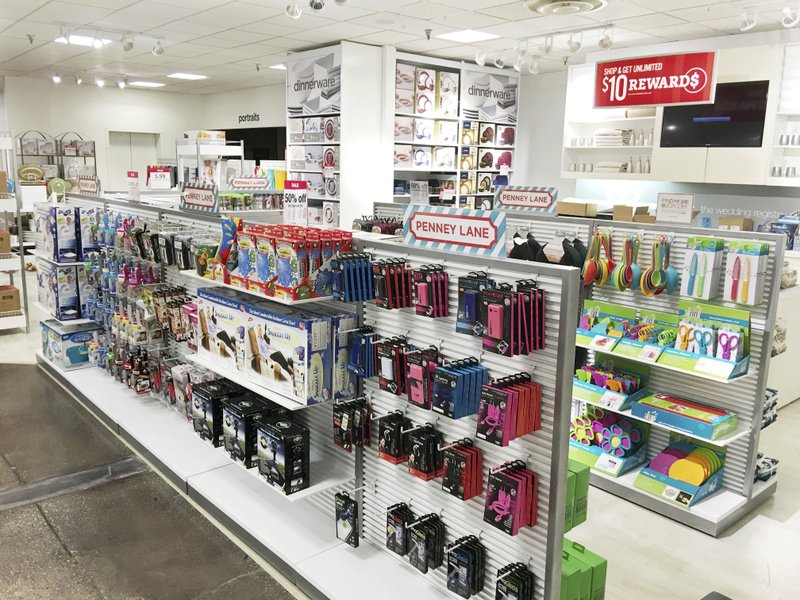 The Associated Press PENNEY LANE: This 2016 photo provided by J.C. Penney shows the "Penney Lane" area of a J.C. Penney store at Collin Creek Mall in Plano, Texas. Retailers are making a bigger push to offer grab-and-go items. J.C. Penney has "Penney Lane" mini-shops, filled with items under $10 like air fresheners and adult coloring books.