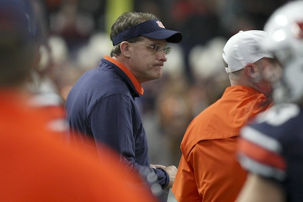 Auburn coach Gus Malzahn watches his team warm up for the Southeastern Conference championship NCAA college football game against Georgia on Saturday, Dec. 2, 2017, in Atlanta, Ga. (C.B. Schmelter/Chattanooga Times Free Press via AP)
