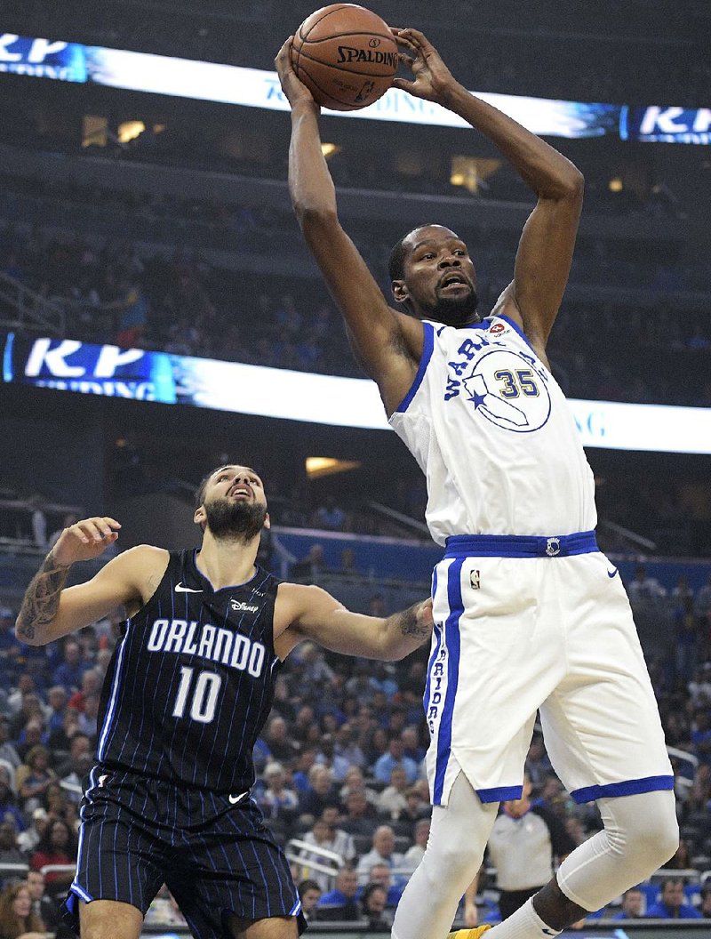 Golden State Warriors forward Kevin Durant  (35) was not  thrilled about getting ejected in Friday night’s victory over the Orlando Magic. Durant’s frustration stemmed from not being awarded free throws when he appeared to be in the act of shooting.