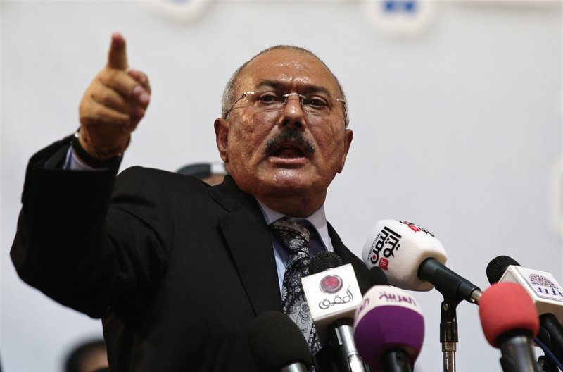 FILE - In this Sept. 3, 2012 file photo, former Yemeni President Ali Abdullah Saleh speaks during a ceremony marking the 30th anniversary of his General People's Congress party in Sanaa, Yemen. Saleh, Yemen’s most powerful leader, who played a central role in the country’s civil war, has been killed, according to several Yemeni officials and a militias’ video which showed the man dressed in a dark suit, motionless, and carried in a blanket amid chants of “God is Great.” Saleh’s death was announced Monday, Dec. 4, 2017, by Yemen’s Houthi rebels, who have been fighting Saleh’s forces for the past week. (AP Photo/Hani Mohammed, File)
