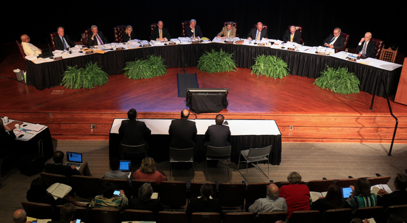 The University of Arkansas Board of Trustees are shown in this May 2017 file photo.
