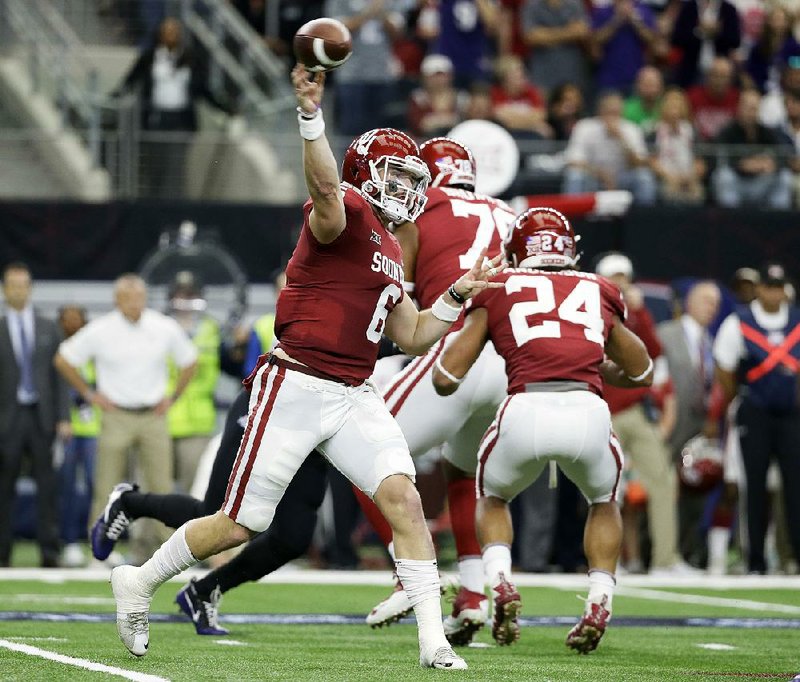 Oklahoma quarterback Baker Mayfield (6) is one of three finalists for the Heisman Trophy. The other two are Louisville quarterback Lamar Jackson, who won the award last year, and Stanford running back Bryce Love.