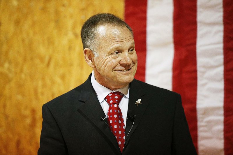 Former Alabama Chief Justice and U.S. Senate candidate Roy Moore speaks at a campaign rally, Thursday, Nov. 30, 2017 in Dora, Ala. 