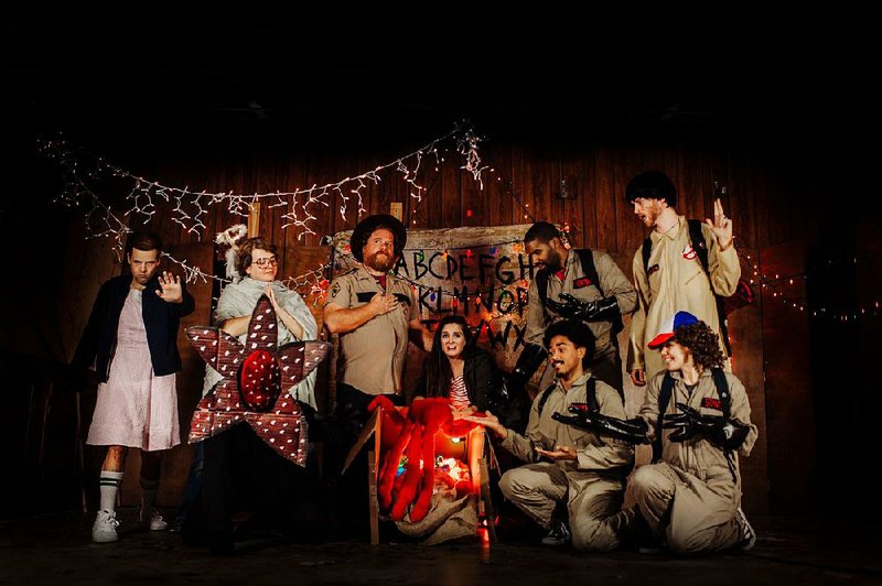 Red Octopus Theater’s Pagans on Bobsleds XXVI: Manger Things! cast — (from left) Anderson Penix, Scott Dombroski, Courtney Beard, Josh Doering, Alli Clark, Ron McDaniel, Jeremiah Herman, Sarena Crowe and Sam Grubb — are onstage Wednesday-Saturday at the Public Theatre in Little Rock.