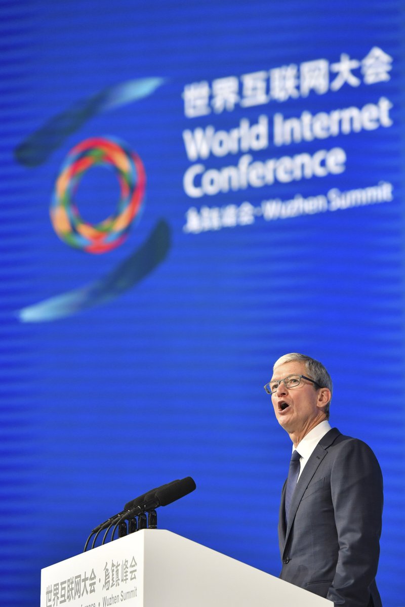 Apple's CEO Tim Cook delivers a speech at the opening ceremony of the Fourth World Internet Conference in Wuzhen town in Tongxiang, East China's Zhejiang province, Sunday Dec. 03, 2017. 