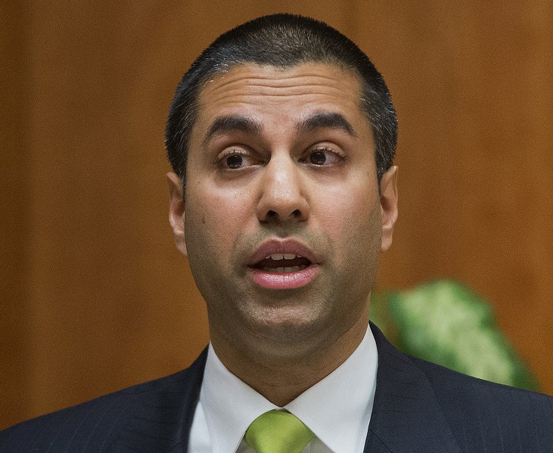 In this Feb. 26, 2015, file photo, Federal Communication Commission Commissioner Ajit Pai speaks during an open hearing and vote on "Net Neutrality" in Washington. 