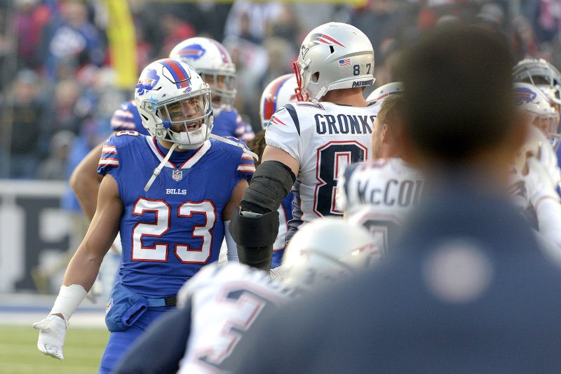 The Associated Press CHEAP SHOT: Buffalo Bills strong safety Micah Hyde (23) argues with New England Patriots tight end Rob Gronkowski (87) during the second half of an NFL game Sunday in Orchard Park, N.Y. Gronkowski hit a defenseless Tre'Davious White on a dead ball, leading to a one-game suspension but was not ejected from the game.