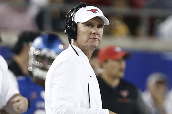 SMU head coach Chad Morris directs the Mustangs against Central Florida during the first half of an NCAA college football game, Saturday, Nov. 4, 2017, in Dallas. (AP Photo/Mike Stone)

