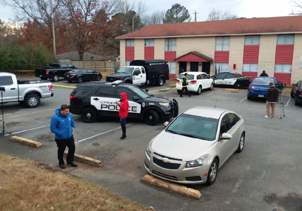 Homicide detectives respond after three people were found dead at a Little Rock apartment Tuesday, Dec. 5, 2017.