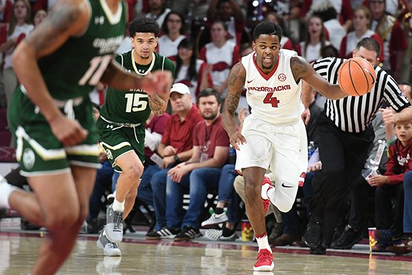 Arkansas guard Daryl Macon brings the ball up the floor during a game against Colorado State on Tuesday, Dec. 5, 2017, in Fayetteville. 
