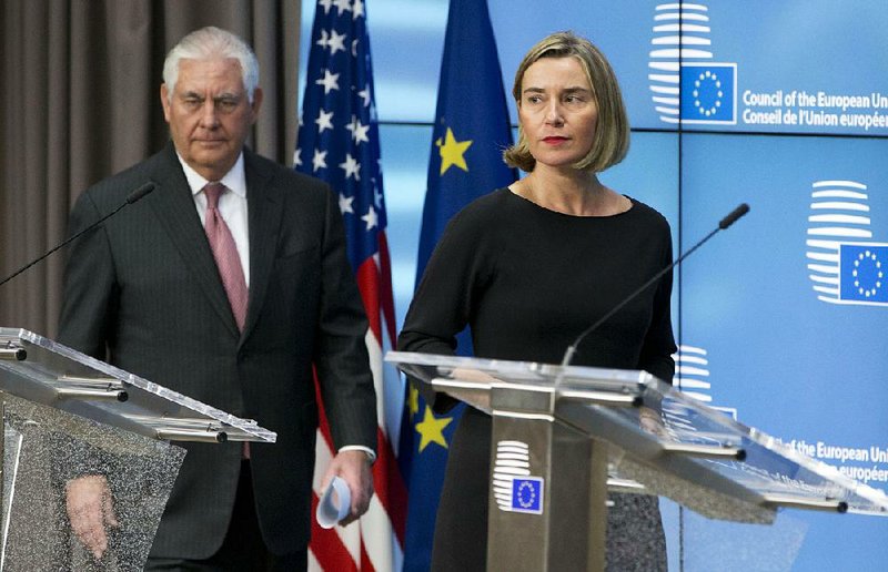 Secretary of State Rex Tillerson and Federica Mogherini, the European Union’s top diplomat, arrive for a news conference Tuesday in Brussels after Tillerson faced a chilly reception at a foreign-policy conference. Mogherini said the EU saw the Trump administration’s possible announcement regarding Jerusalem as a threat to peace in the Middle East.  