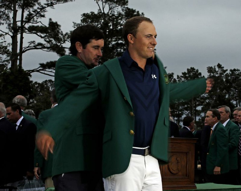 2015 Masters champion Jordan Spieth (right) has never bothered to get his green jacket tailored. He said he’s never trusted anyone to do the proper alterations. 
